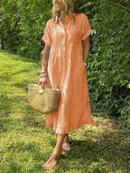 Robe femme maxi fluide boutonnée col rond manches courtes élégante été